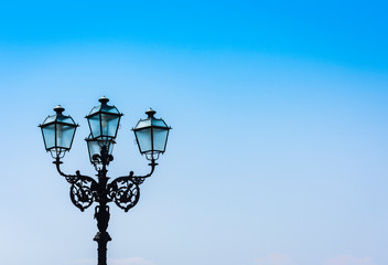 Fototapeta na wymiar Old street lamppost – vintage light on streets in Catania, Sicily, Italy