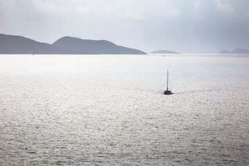 Sailing ship yacht in the open sea at the morning