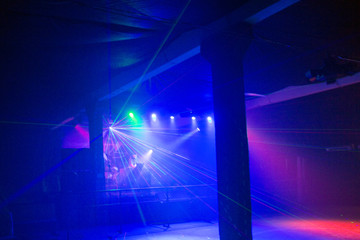 Laser show in a nightclub. Stage lights. Soffits. Concert light