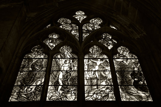 METZ, FRANCE - DECEMBER 19, 2015: Marc Chagall's stained glass window in the cathedral of Metz. Sepia historic photo