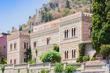 Fototapeta na wymiar Travel to Taormina: historical building Palazzo Corvaja, Sicily, Italy