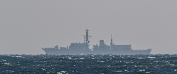 STORMY SEA - Outline of a warship on the horizon   © Wojciech Wrzesień