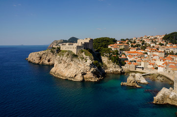 Fototapeta na wymiar Landscape of an old fortress town by the sea. Cityscape of Dubrovnik, Croatia.