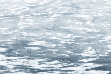 Ice with show on frozen river in winter season