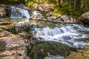 The Studenovodske waterfalls on a stream in the forest, High Tatras National Park, Slovakia, Europe.
