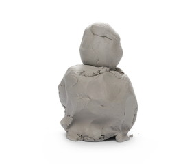 Grey sculpturing, modelling clay isolated on white background
