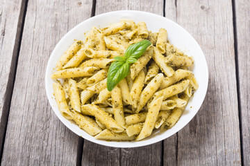 Italian penne pasta with sauce pesto