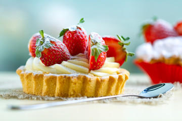 Tasty strawberry cake with whipped cream and with fresh strawberries. Pastry. Sweet dessert
