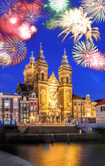 Fototapeta na wymiar Amsterdam with firework (celebration of the New Year) in Holland