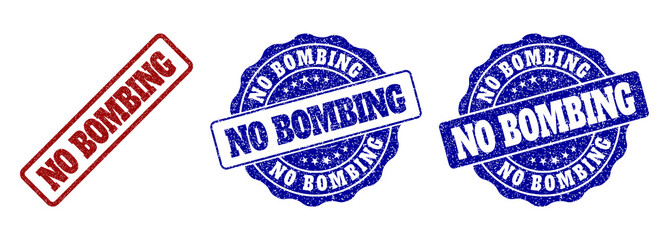 NO BOMBING scratched stamp seals in red and blue colors. Vector NO BOMBING labels with scratced texture. Graphic elements are rounded rectangles, rosettes, circles and text labels.