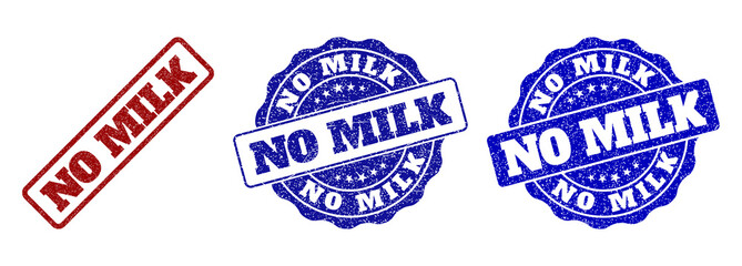 NO MILK grunge stamp seals in red and blue colors. Vector NO MILK signs with grunge surface. Graphic elements are rounded rectangles, rosettes, circles and text captions.