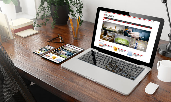 devices e-magazine on wooden desktop