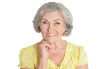 Beautiful senior woman, posing against white background