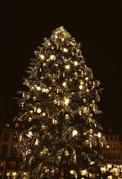 Christmas tree and illumination in Strasbourg (France), capital of Noel.  Sepia photo.