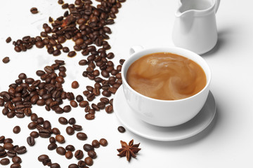 Coffee bean small cup full of coffee bean isolated on white