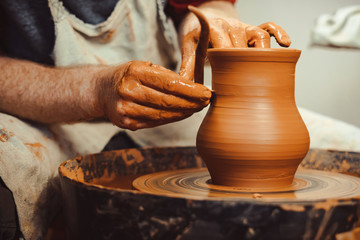 Potter makes a jug