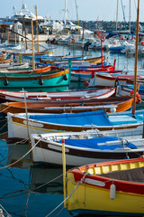 Fototapeta na wymiar Close up on colourful fishing boats in the port of Nice in southeastern France.