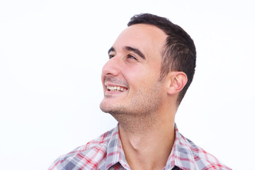 Obraz premium Close up happy latin man looking away against isolated white background