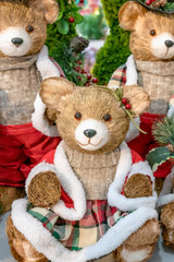 Colorful portrait of puppet doll toy teddy bears, dressed like Santa Claus