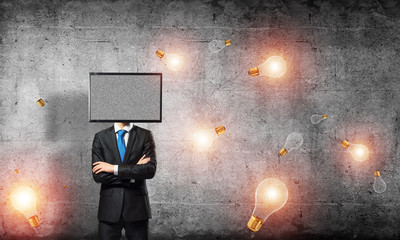 Businessman with TV instead of head.