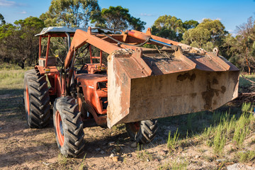 Heavy bulldozer, earthmover machine in rural surroundings