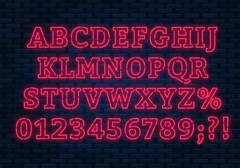 Obraz premium Neon red font. Bright capital letters with numbers on a dark background.