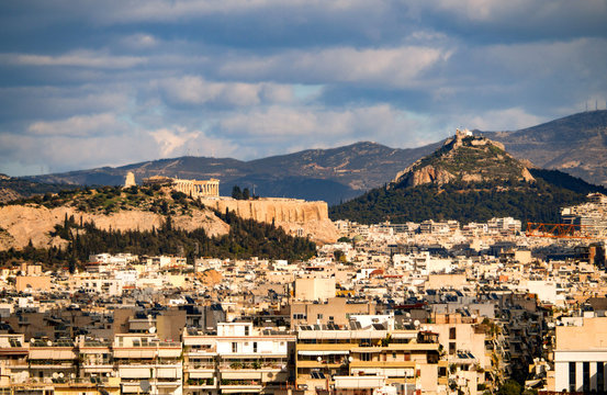 View of Lykavitos hill, Acropolis and Parthenon in the city of Athens, Greece