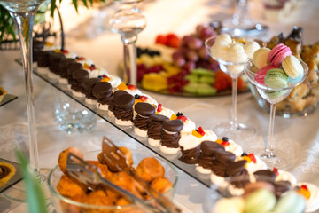 Delicious cakes on candy bar