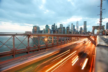 Poster Buildings and transportation on Brooklyn bridge in night New York. © BORIS
