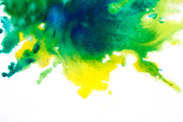 yellow green, blurry spot of watercolor paint. background