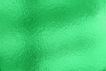 Shiny green  leaf gold foil texture background