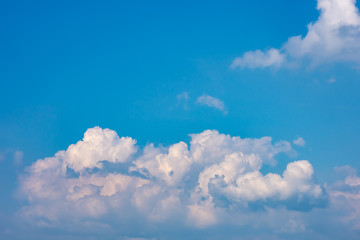 Naklejka na ściany i meble The beauty of the sky with clouds and the sun.