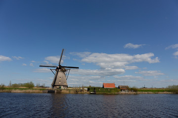 Netherlands rural lanscape with windmills at famous tourist site Kinderdijk in Holland