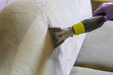 Closeup of upholstered Sofa chemical cleaning