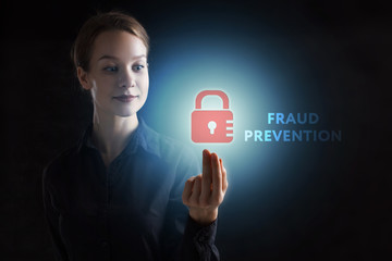 The concept of business, technology, the Internet and the network. A young entrepreneur working on a virtual screen of the future and sees the inscription: Fraud prevention