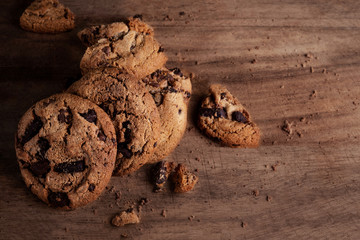 Fototapeta premium Homemade cookies. American chocolate chip cookies on rustic wooden table