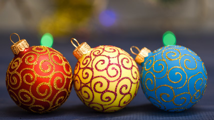 Christmas balls decoration on blue wooden surface. Winter holiday concept. Symbol of new year and christmas holidays. Various christmas decorations. Decorate christmas tree with traditional toys