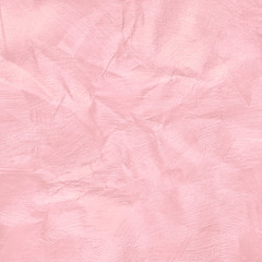 Crumpled pink pastel colour paper texture for background.