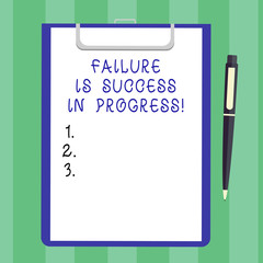 Handwriting text Failure Is Success In Progress. Concept meaning You have to make mistakes for improvement Blank Sheet of Bond Paper on Clipboard with Click Ballpoint Pen Text Space