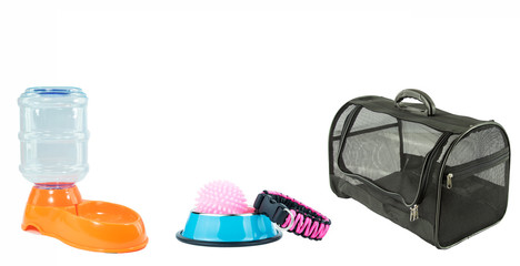 Pet supplies concept.  Pet Bag, Bowls, Leashes, Rubber toy isolated on white