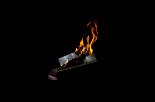 Burning book on a black background