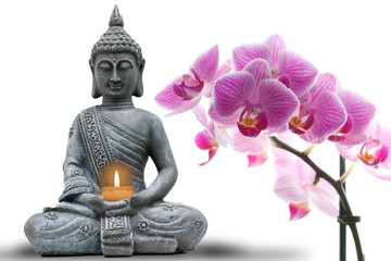 Buddhastatue mit Kerze und Orchideen
