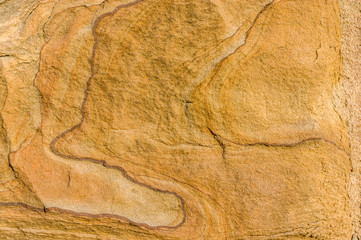 Sandsteinmauer, Sandstein mit künstlerischen Mustern Schraffuren Reliefartigen Formen auf der...