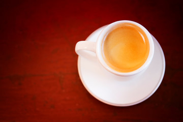 cup of fresh coffee on wooden table