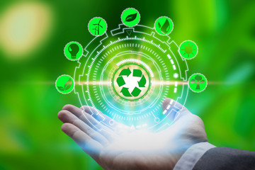 Hand holding with environment icons