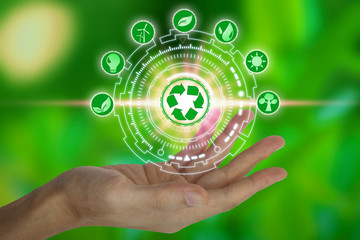 Hand holding with environment icons