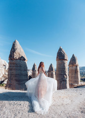 Wedding in Cappadocia G?reme with a young married couple on the background of balloons.