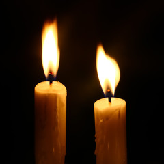burning candles in the dark