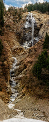 Fototapeta na wymiar Winter Creek in the Dolomites Valley - Alps - Italy