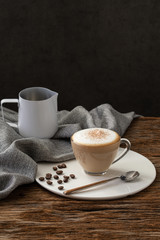 cappuccino coffee clear cup on wood background  for cafe coffee shop menu